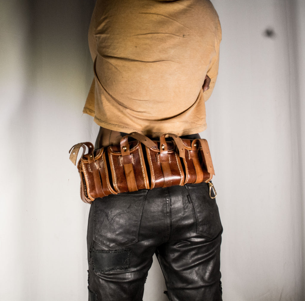 Three-row black stud belt