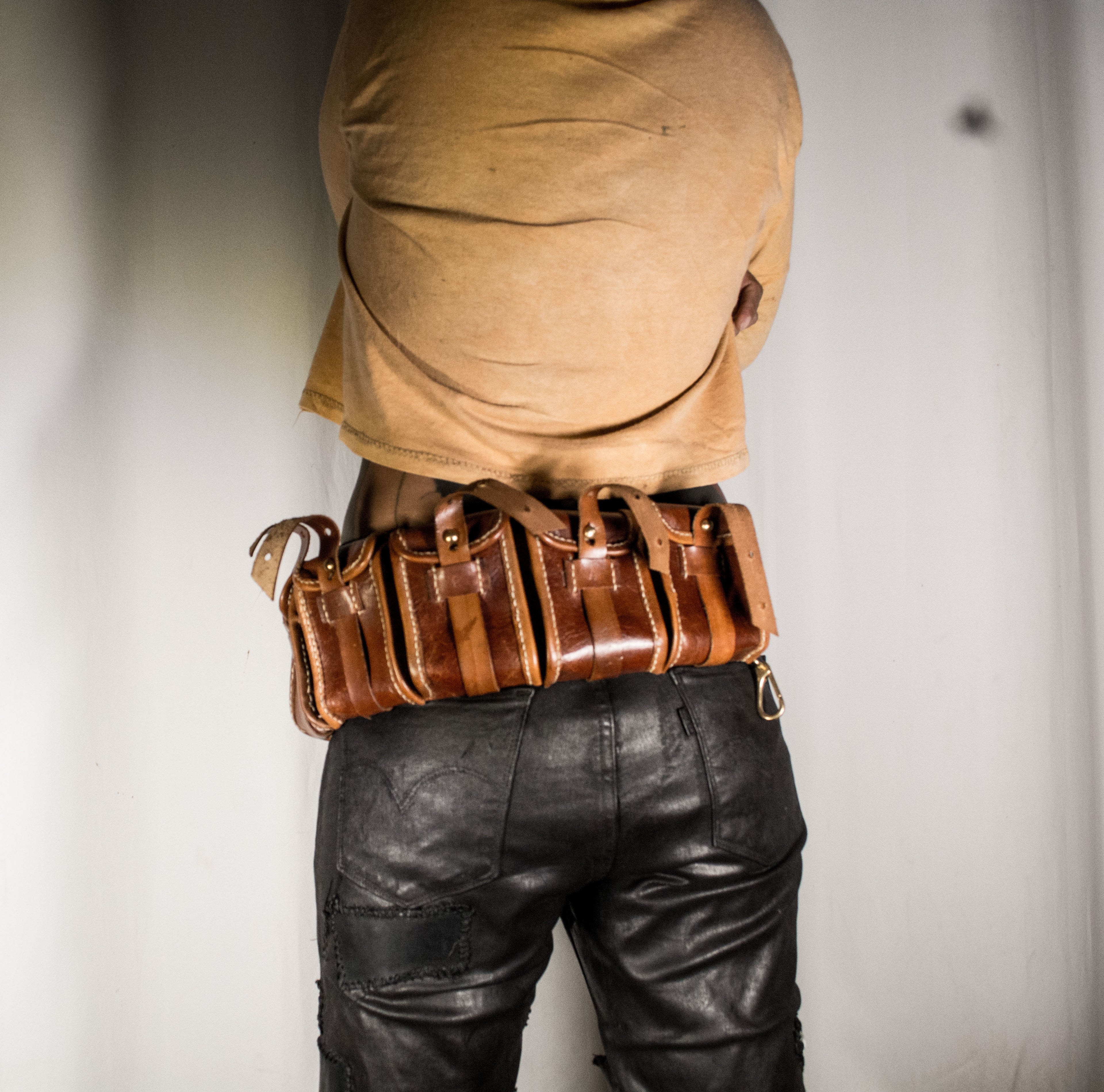 Three-row black stud belt