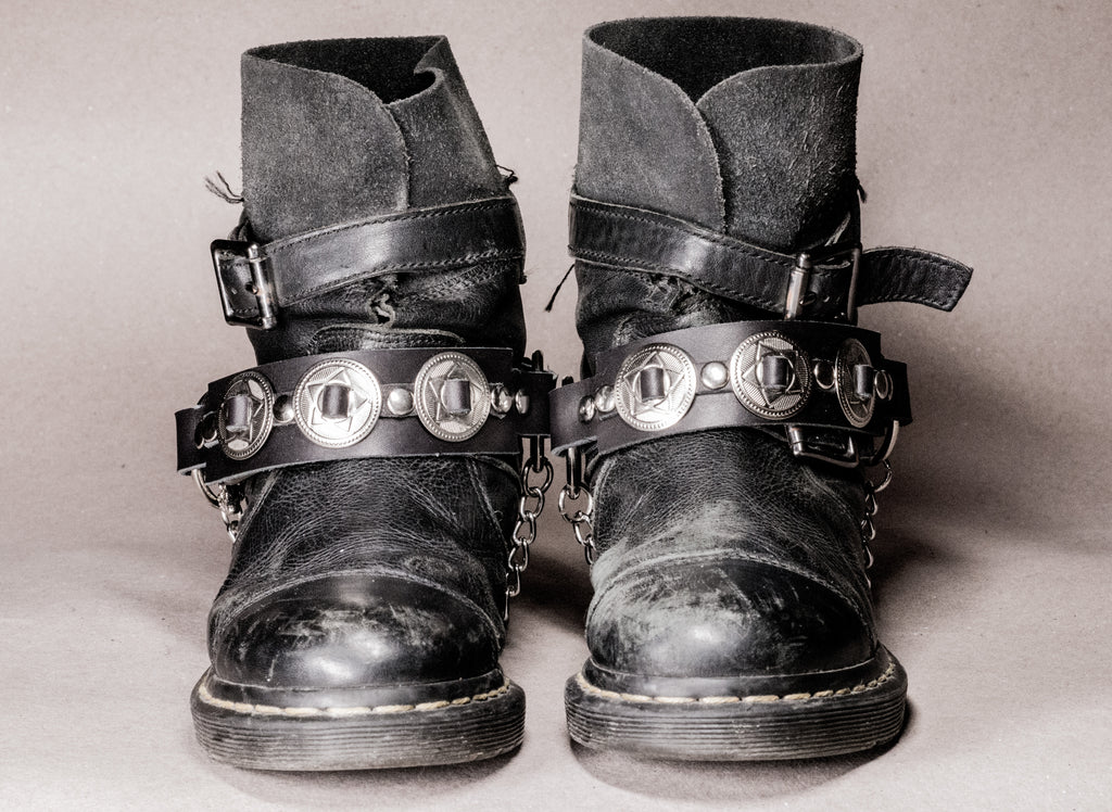 Round silver concho straps