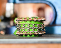 Green stud and chain bracelet