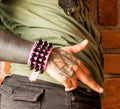 Pink bracelet with black studs