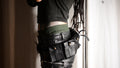 Three-row black stud belt
