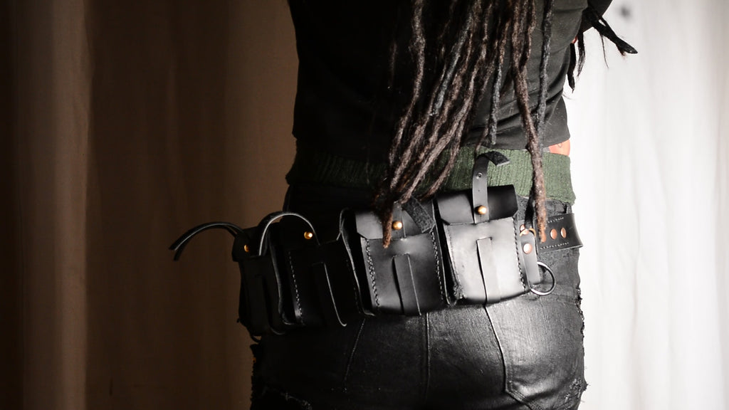 Three-row black stud belt