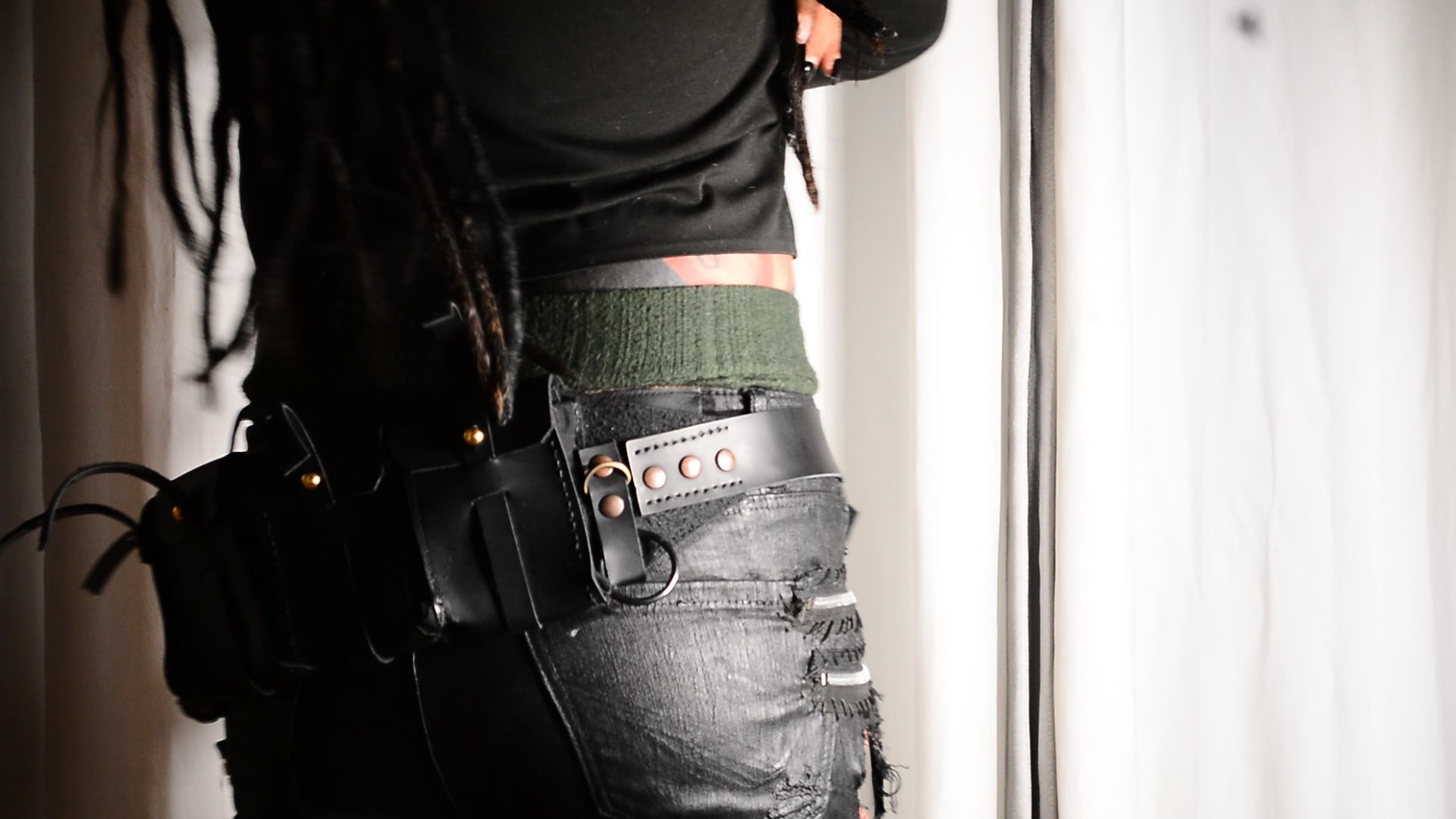 Three-row black stud belt