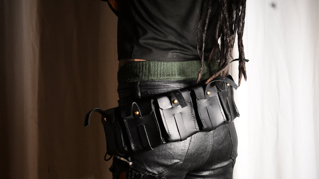 Three-row black stud belt